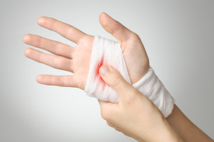 Injured Hand With Bloody Bandage